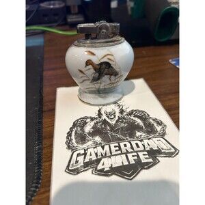 ATC Super DeLuxe Automatic Tabletop Lighter with flying duck design